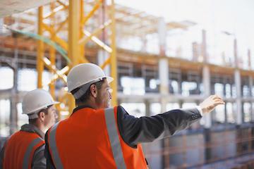 Workers in orange vests